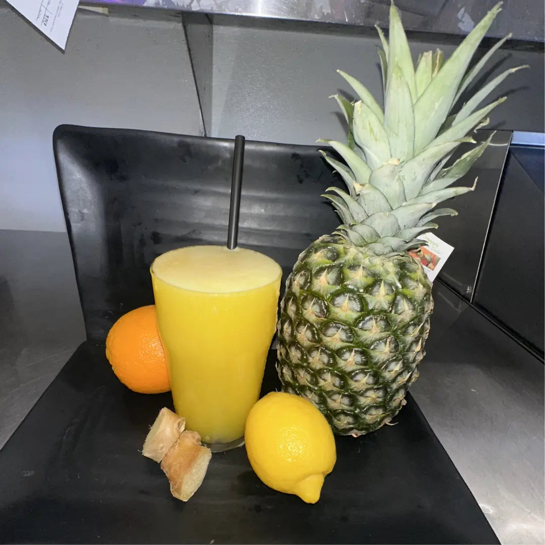 Citrus Lift fresh juice with pineapple, orange, and lemon available for online pickup and delivery from Fresh Juiced Juice Bar in Redlands, California