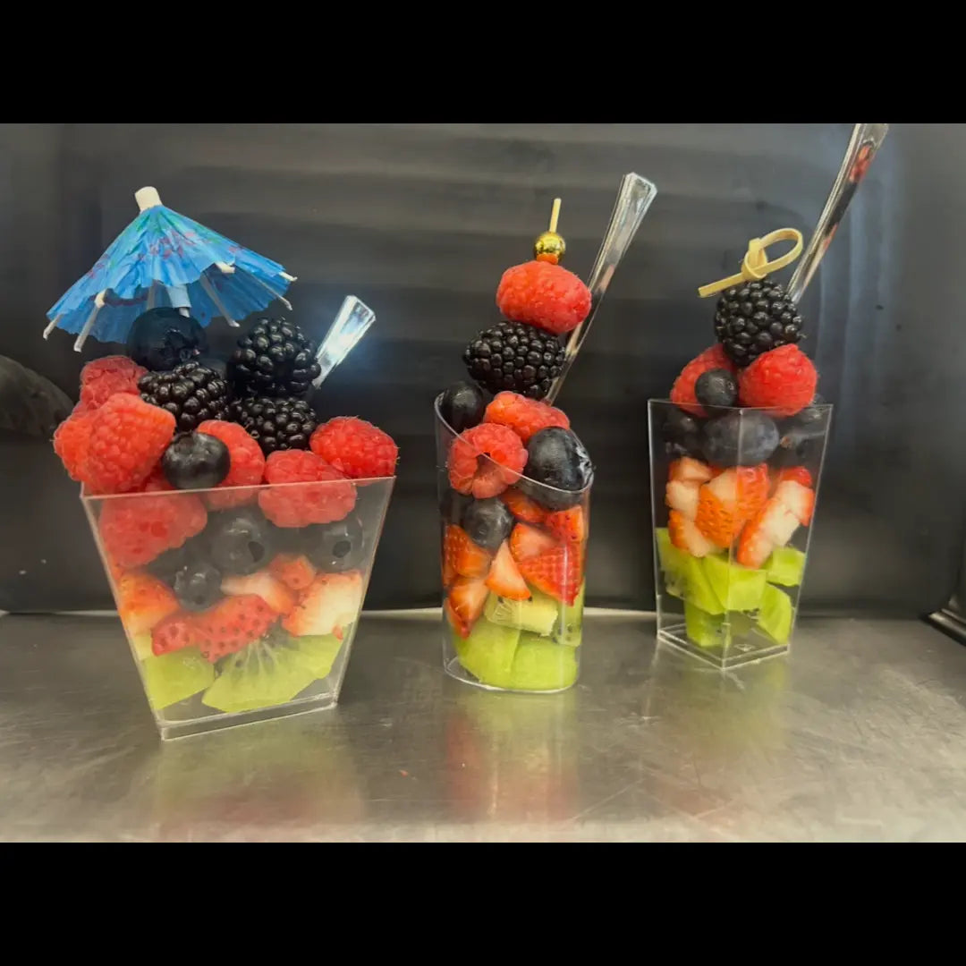Fresh fruit cups with strawberries, blueberries, raspberries, and kiwi available for online pickup and delivery from Fresh Juiced Juice Bar in Redlands, California