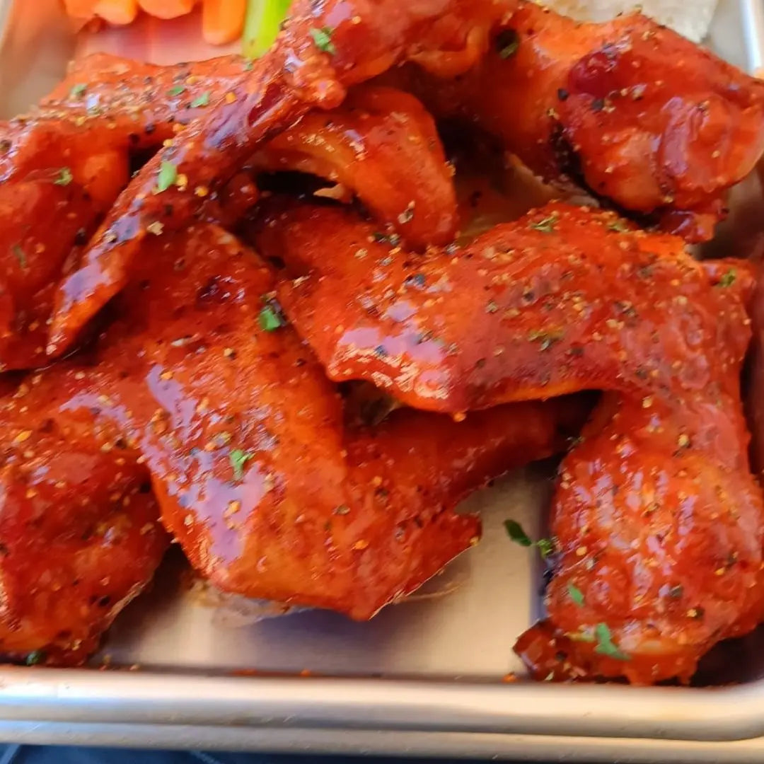 Smoked chicken wings by the pound available for online pickup and delivery from Hoodidya BBQ in Redlands, California