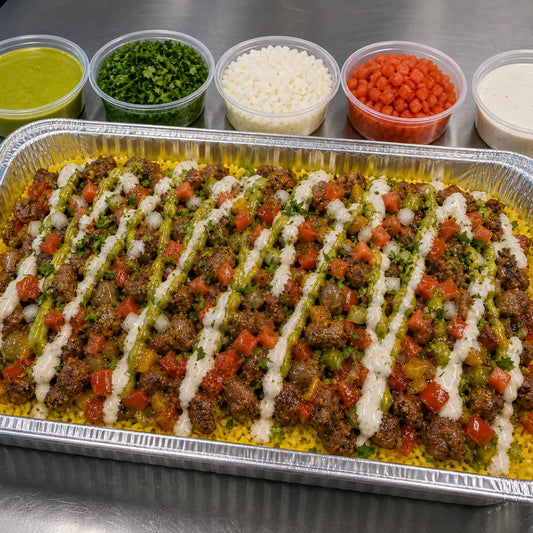 Egyptian sausage catering tray over rice with sauces and toppings available for online pickup and delivery from Redlands Ranch Market in Redlands, California
