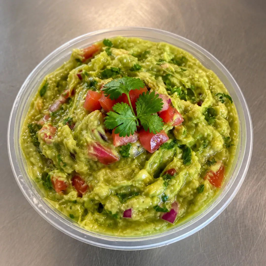 Fresh guacamole dip made with avocado and tomatoes available for online pickup and delivery from Redlands Ranch Market in Redlands, California
