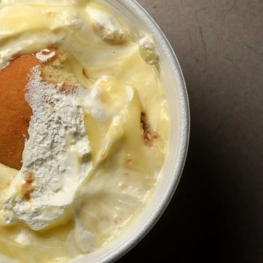 Banana pudding dessert with creamy layers and wafers available for online pickup and delivery from Hoodidya BBQ in Redlands, California