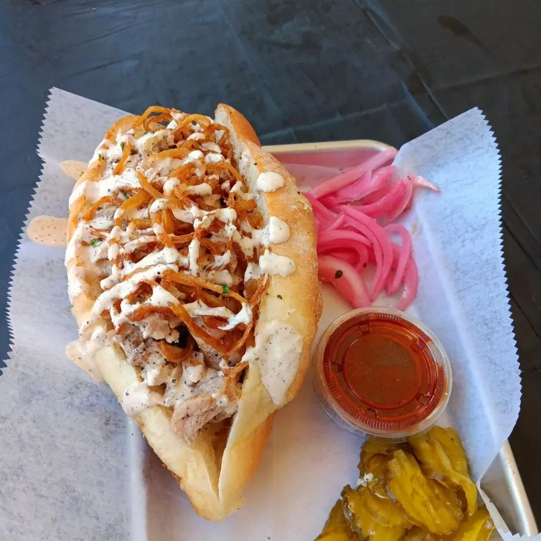 Alabama white sauce pulled chicken sandwich combo with side and drink available for online pickup and delivery from Hoodidya BBQ in Redlands, California