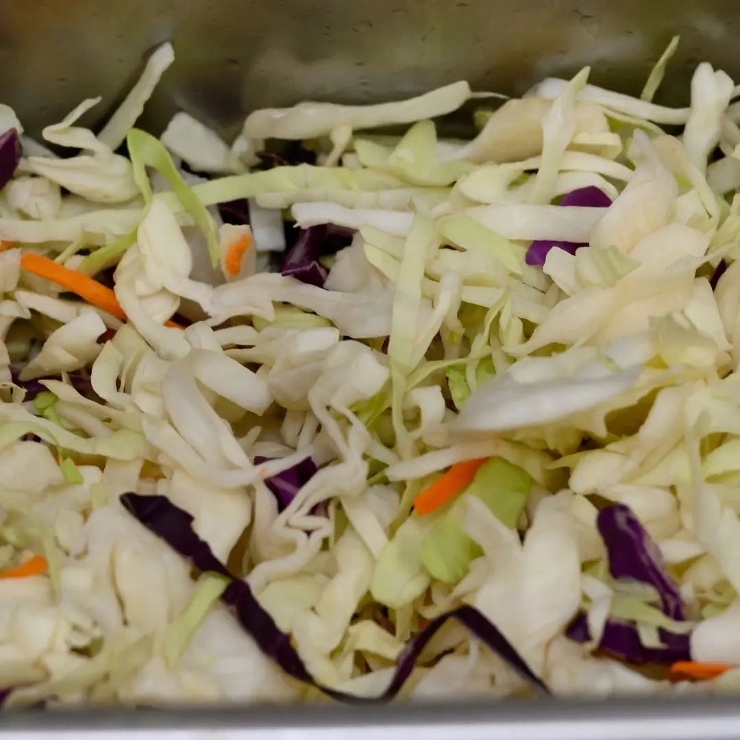 Side of creamy coleslaw available for online pickup and delivery from Hoodidya BBQ in Redlands, California