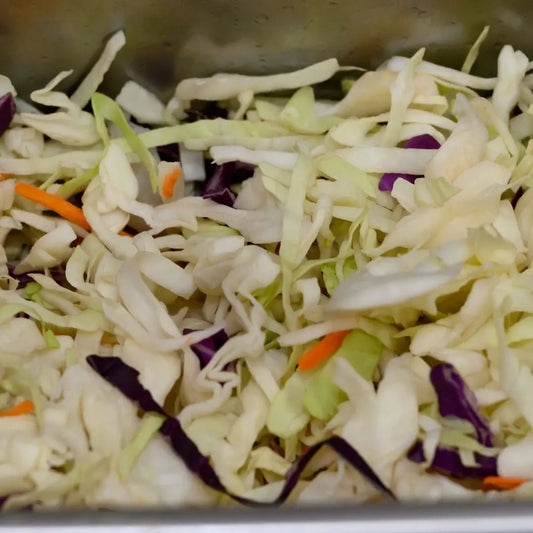 Side of creamy coleslaw available for online pickup and delivery from Hoodidya BBQ in Redlands, California