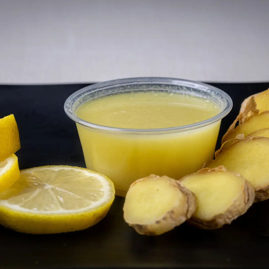 Immunity shot with ginger and lemon available for online pickup and delivery from Fresh Juiced Juice Bar in Redlands, California
