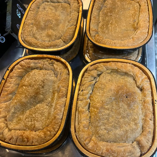 Smoked BBQ pot pie with flaky crust filled with brisket, chicken, or turkey and vegetables available for online pickup and delivery from Hoodidya BBQ in Redlands, California