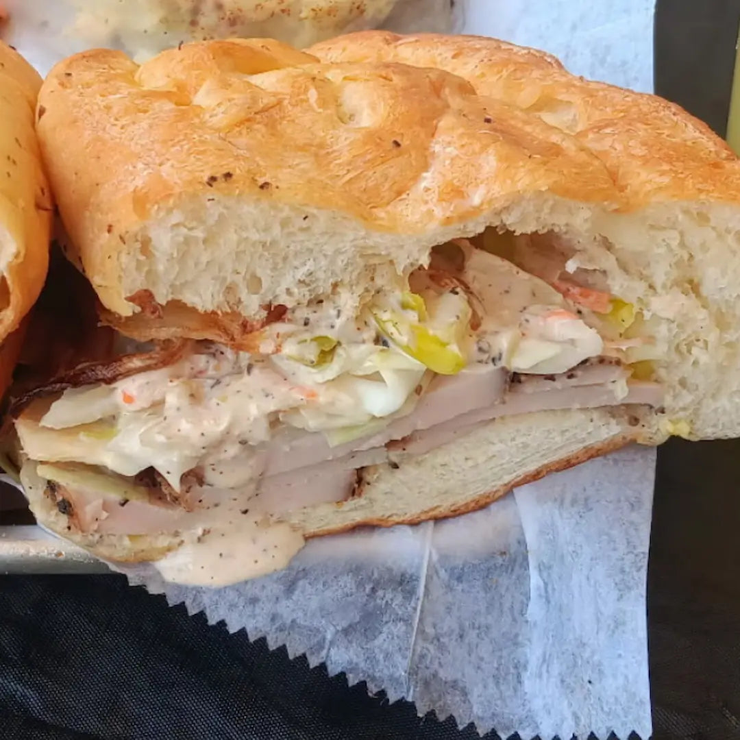 BBQ turkey breast sandwich on a soft roll available for online pickup and delivery from Hoodidya BBQ in Redlands, California
